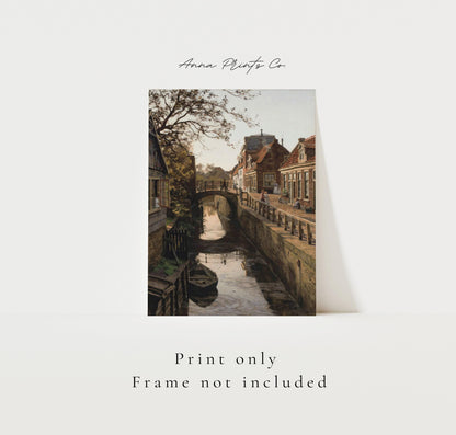Vintage art print of Dutch Canal Cityscape Paintig with text overlay stating frame not included
