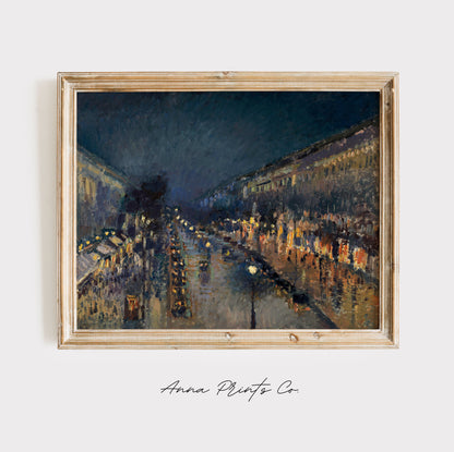 Vintage art print of Boulevard Montmartre at Night Pissarro displayed in wooden frame