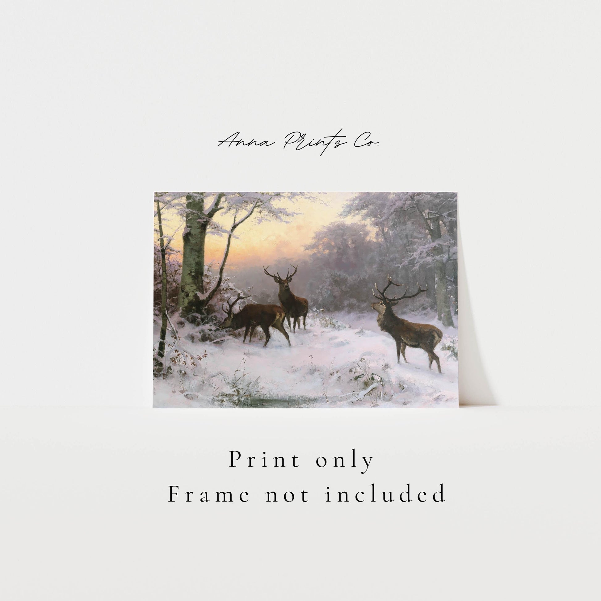 Vintage art print of Deer in Winter Forest Landscape with text overlay stating frame not included