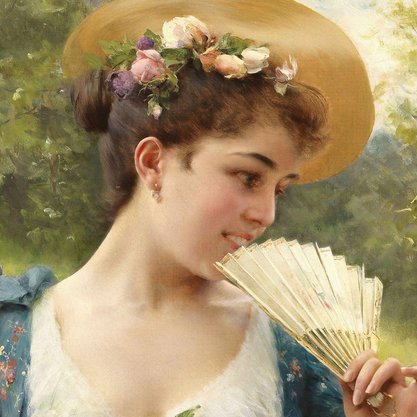 Woman with a straw hat and floral decorations holding a fan, with a blurred natural background