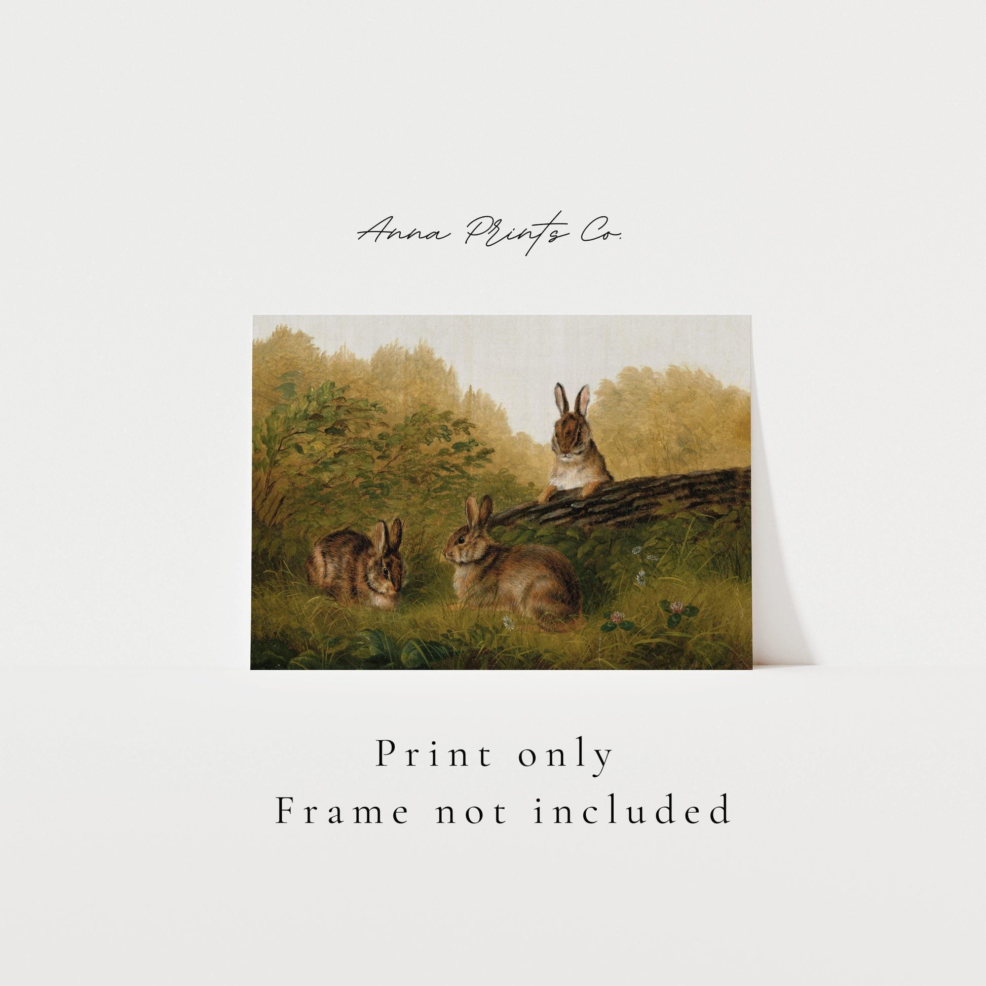 Vintage art print of Rabbits on a Log Animal Painting with text overlay stating frame not included