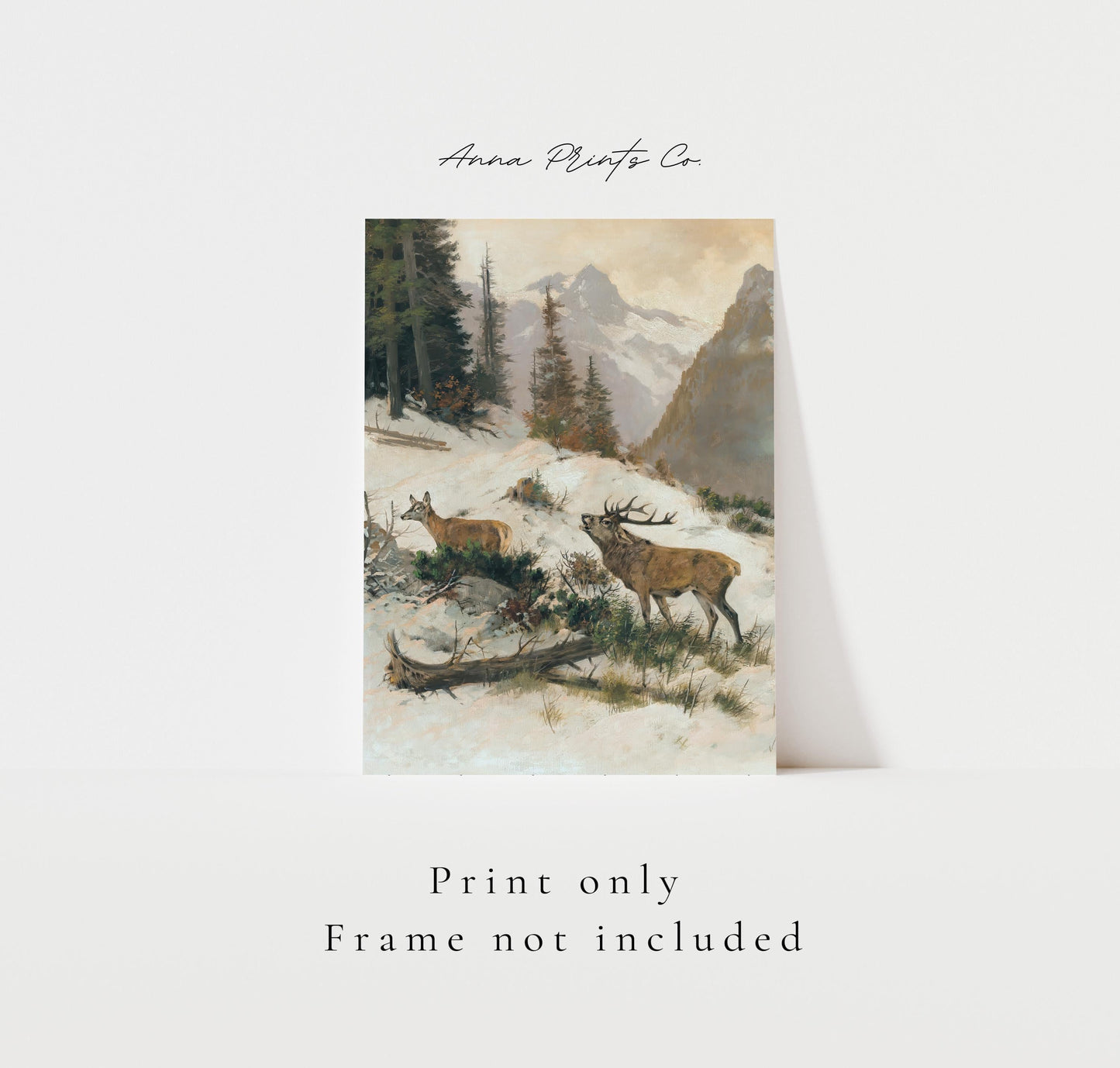 Vintage art print of Deer in Mountain Landscape in Winter with text overlay stating frame not included