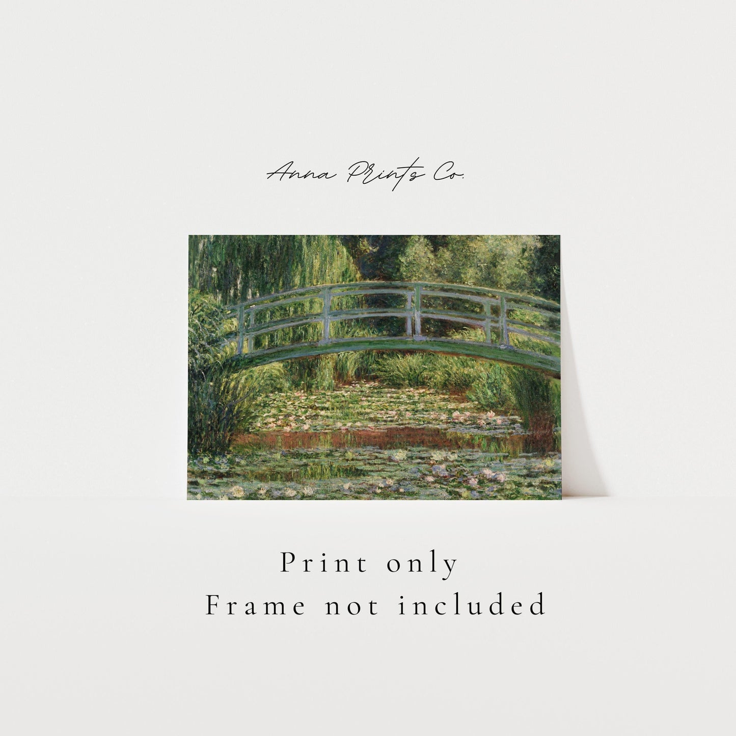 Vintage art print of The Japanese Footbridge by Monet with text overlay stating frame not included
