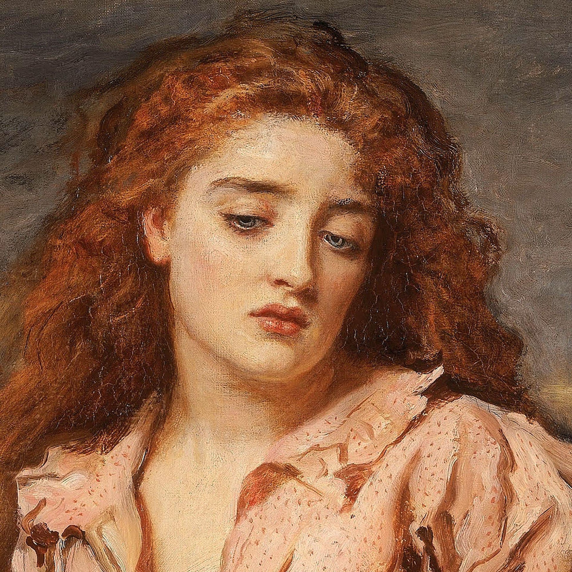 Artistic portrait of a woman with red hair and a pink blouse against a dark background