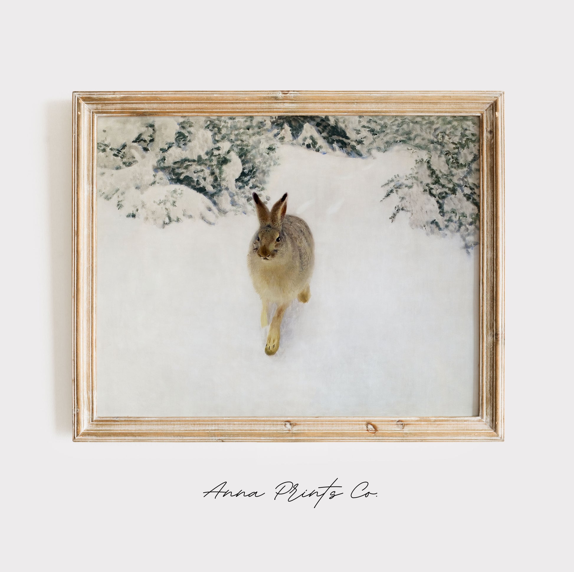 Vintage art print of Hare in Winter Landscape Painting displayed in wooden frame