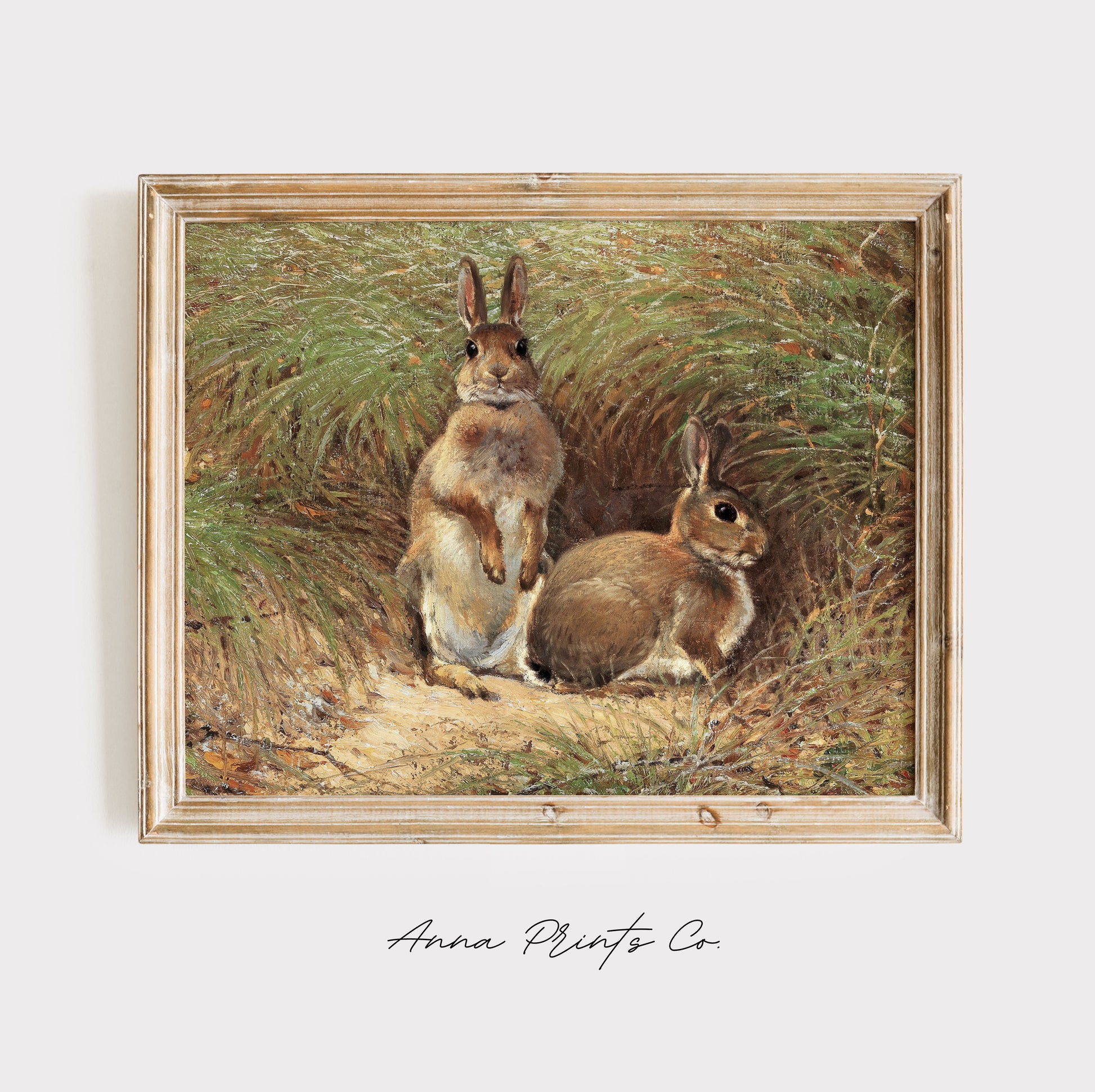 Vintage art print of Rabbits Cottage Animal Painting displayed in wooden frame