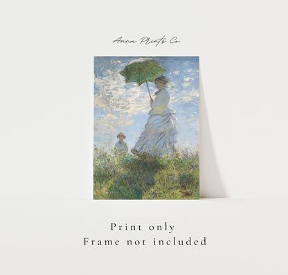 Vintage art print of Woman with a Parasol by Monet with text overlay stating frame not included