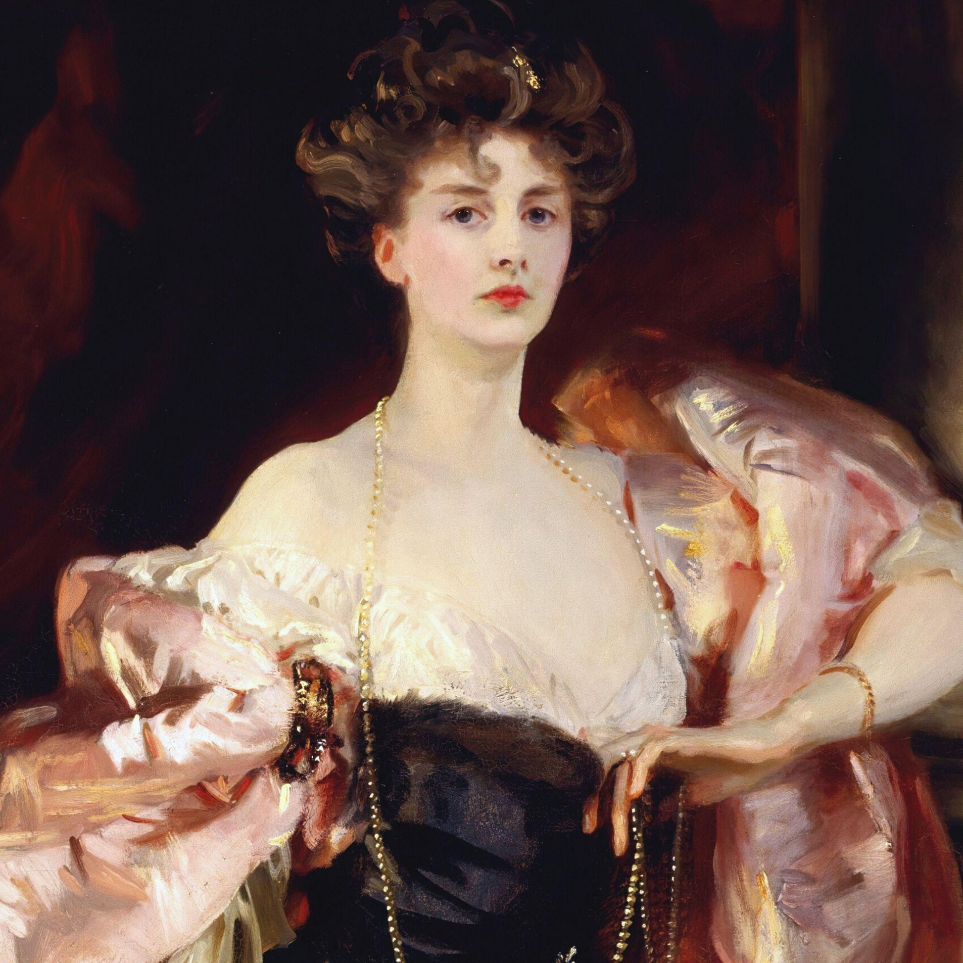 Portrait of a woman in an elaborate dress with a dark background