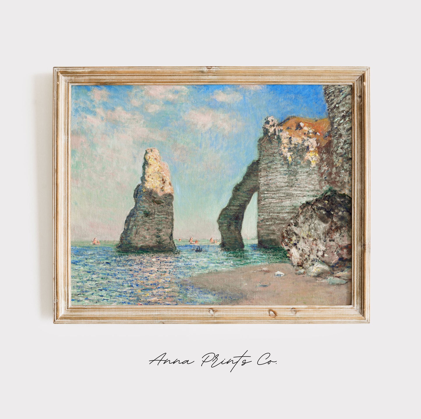 Vintage art print of The Cliffs at Étretat by Monet displayed in wooden frame