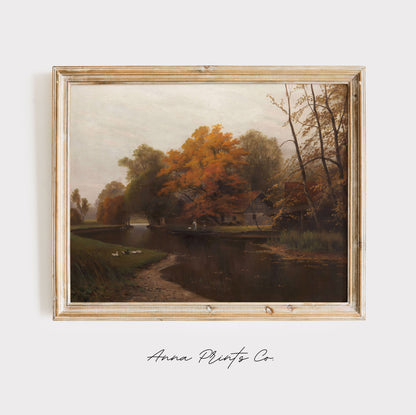 Vintage art print of Autumn by the Water Landscape displayed in wooden frame