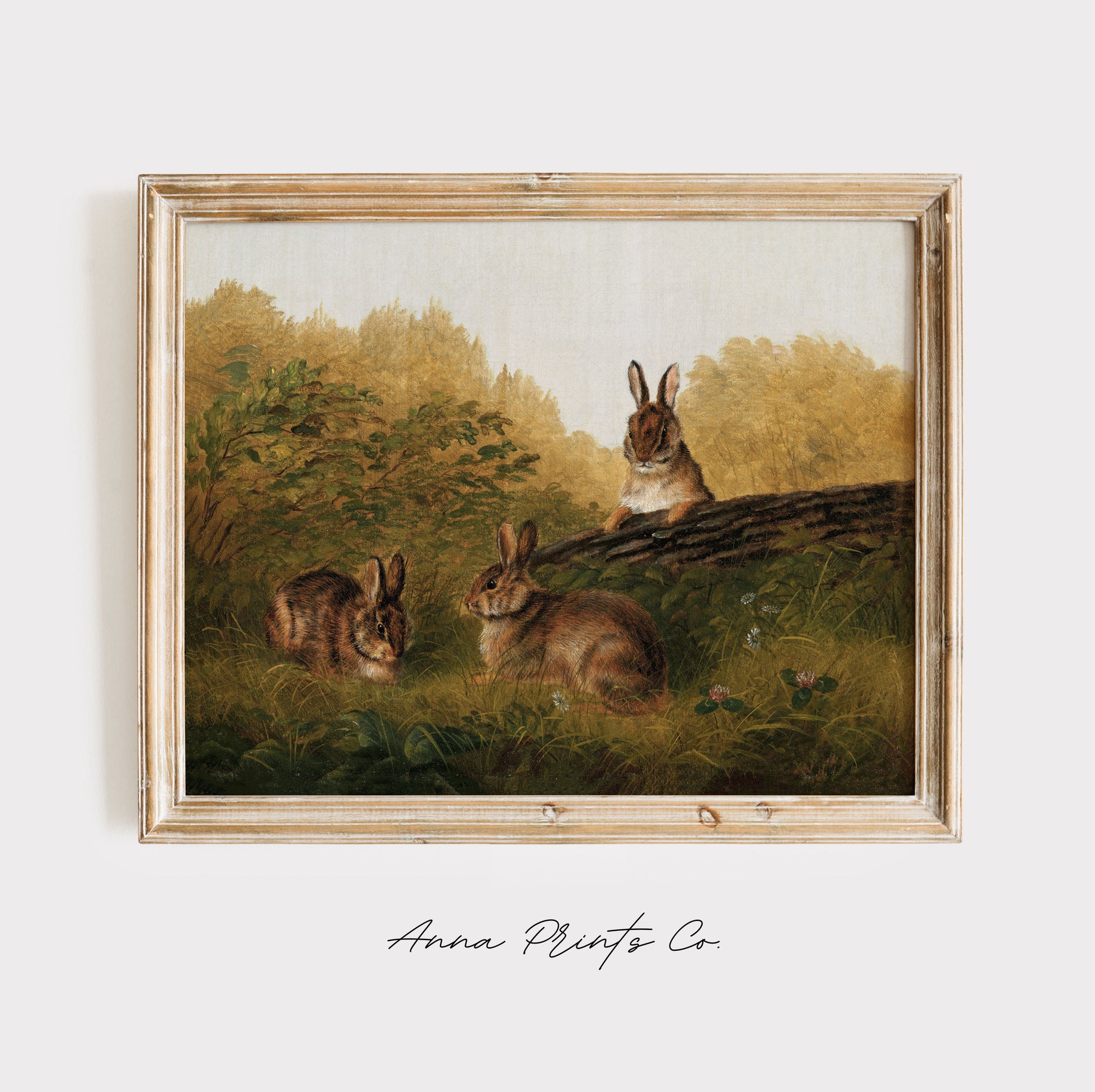 Vintage art print of Rabbits on a Log Animal Painting displayed in wooden frame