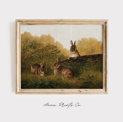 Vintage art print of Rabbits on a Log Animal Painting displayed in wooden frame