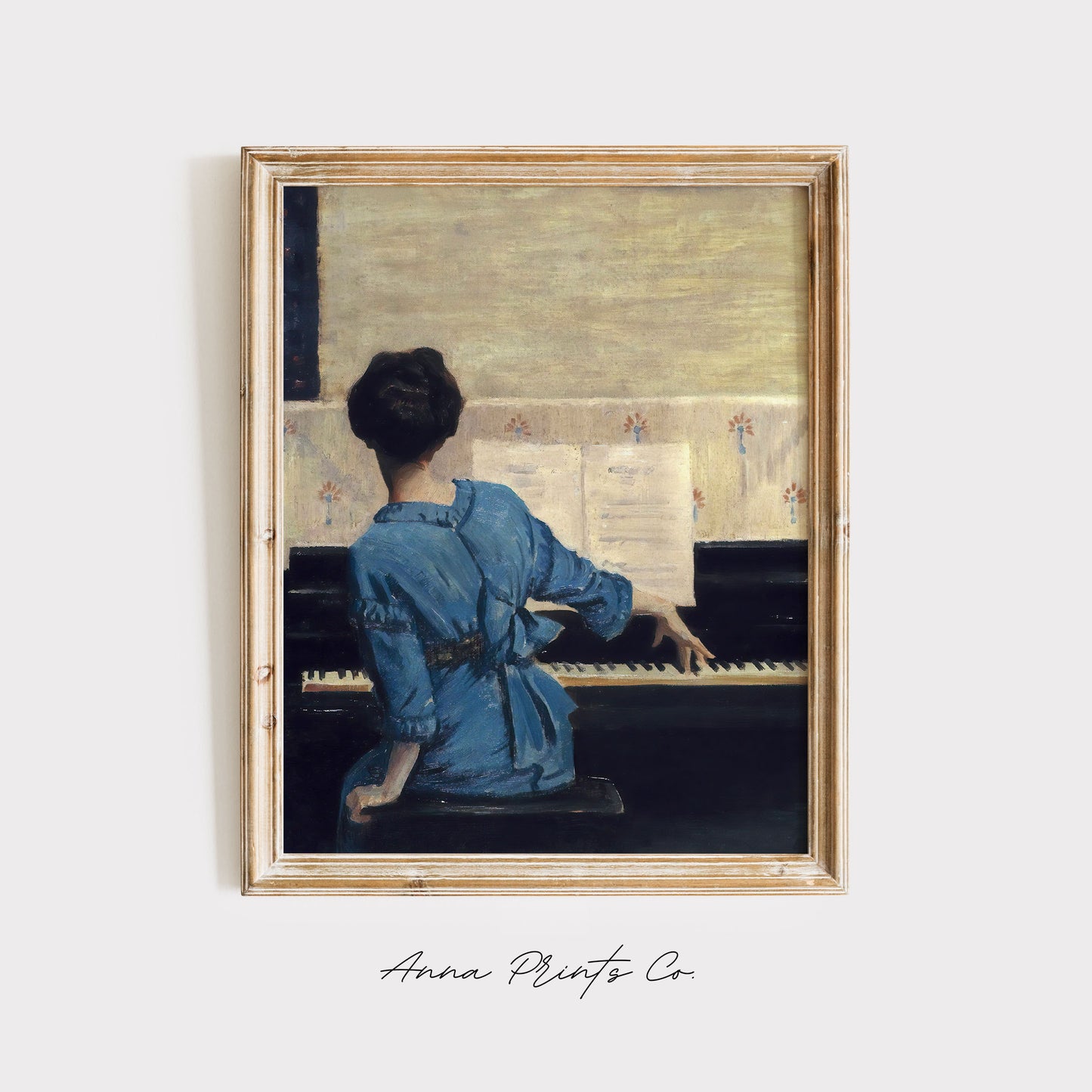 Vintage art print of Woman Playing Piano Painting displayed in wooden frame