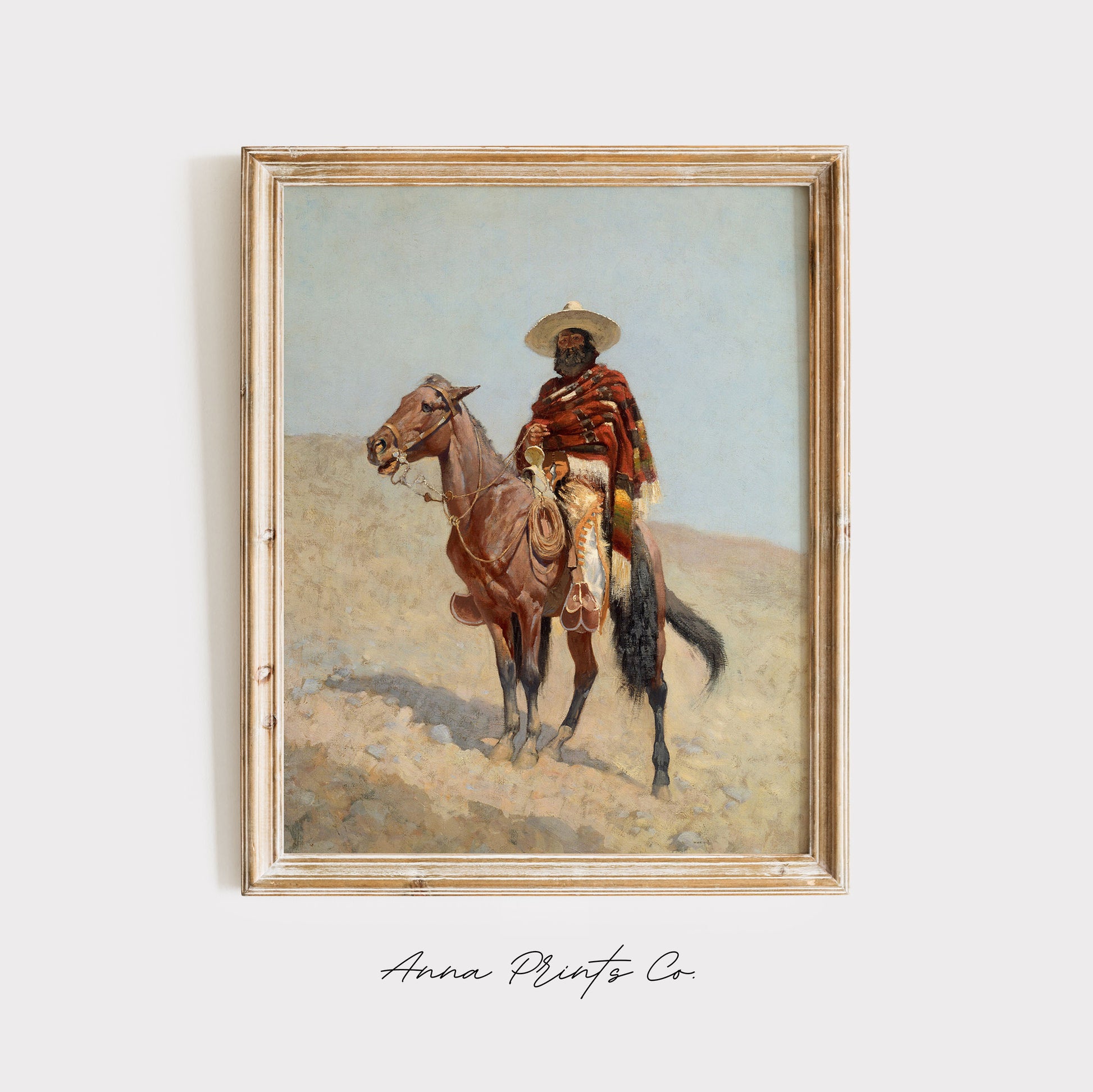 Vintage art print of Mexican Vaquero by Remington displayed in wooden frame