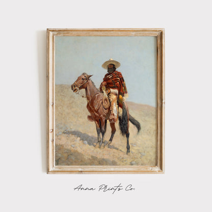 Vintage art print of Mexican Vaquero by Remington displayed in wooden frame