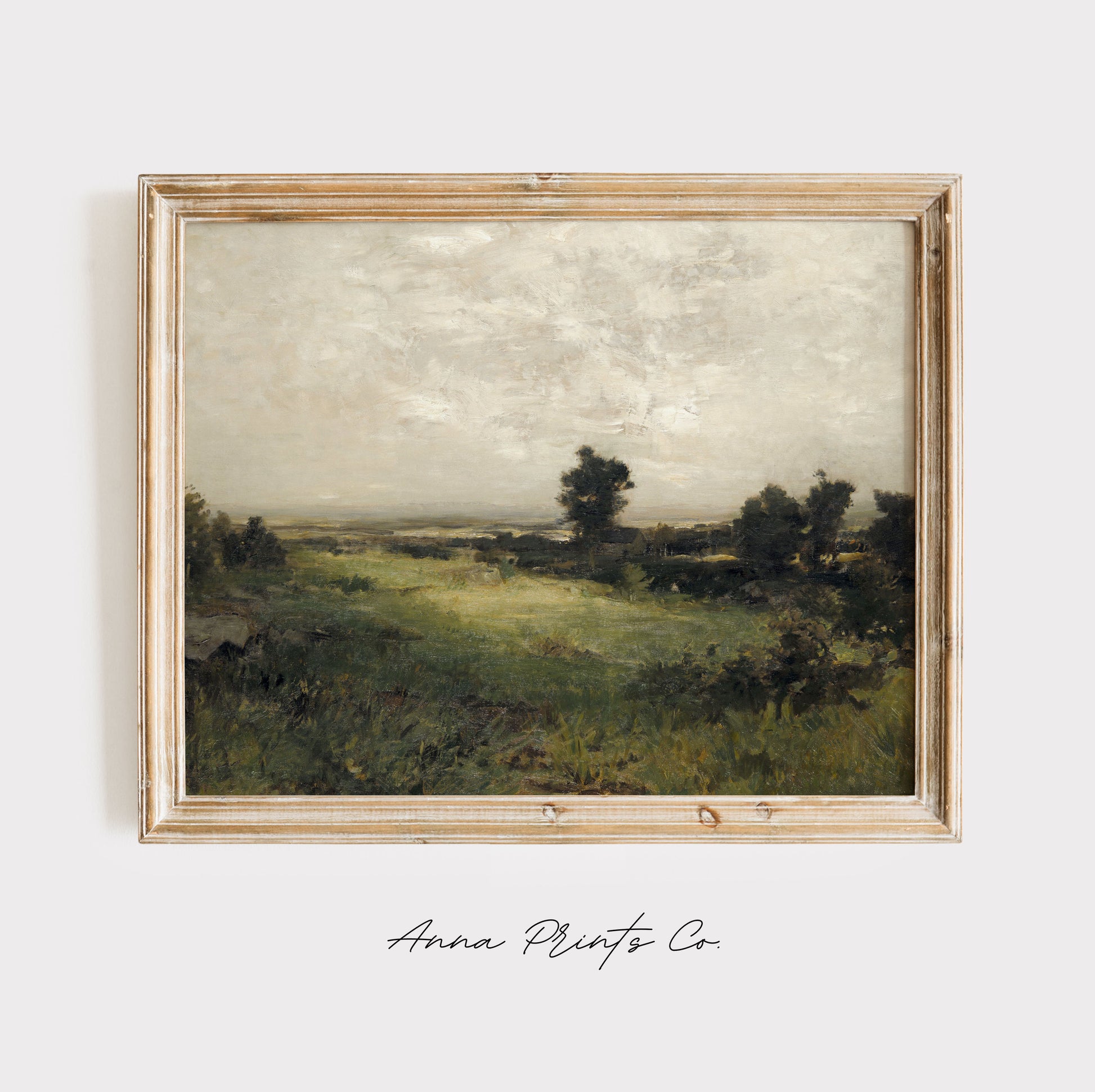 Vintage art print of Moody Green Landscape Painting displayed in wooden frame