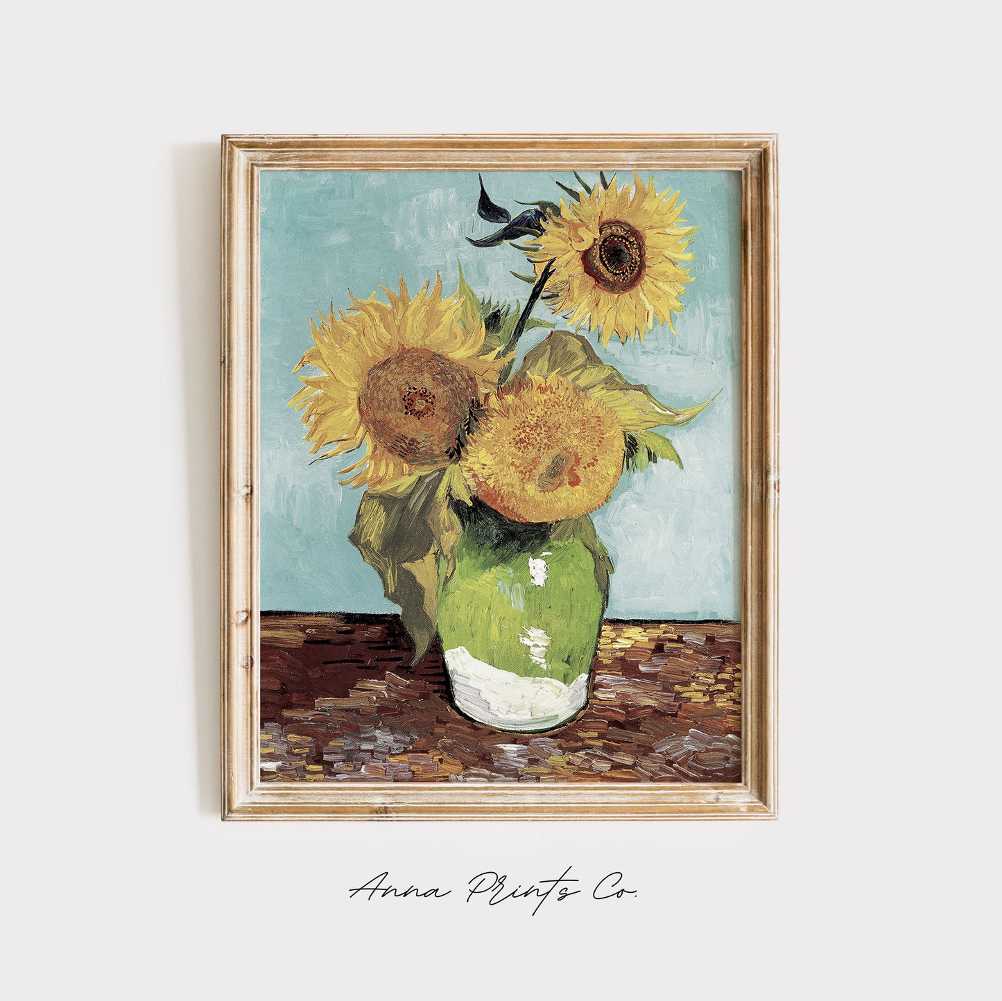 Vintage art print of Three Sunflowers by Van Gogh displayed in wooden frame