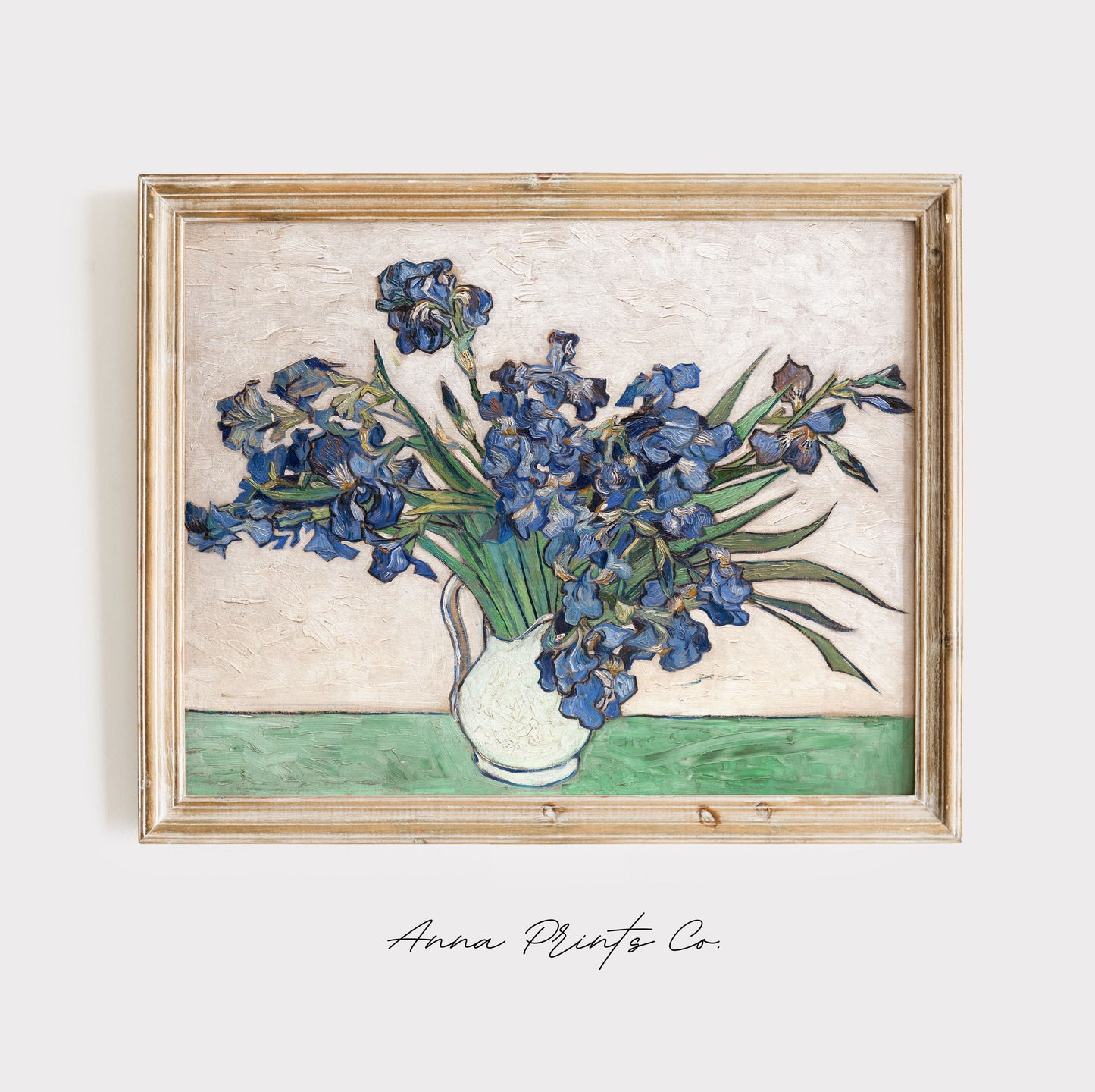 Vintage art print of Irises in Vase by Van Gogh displayed in wooden frame