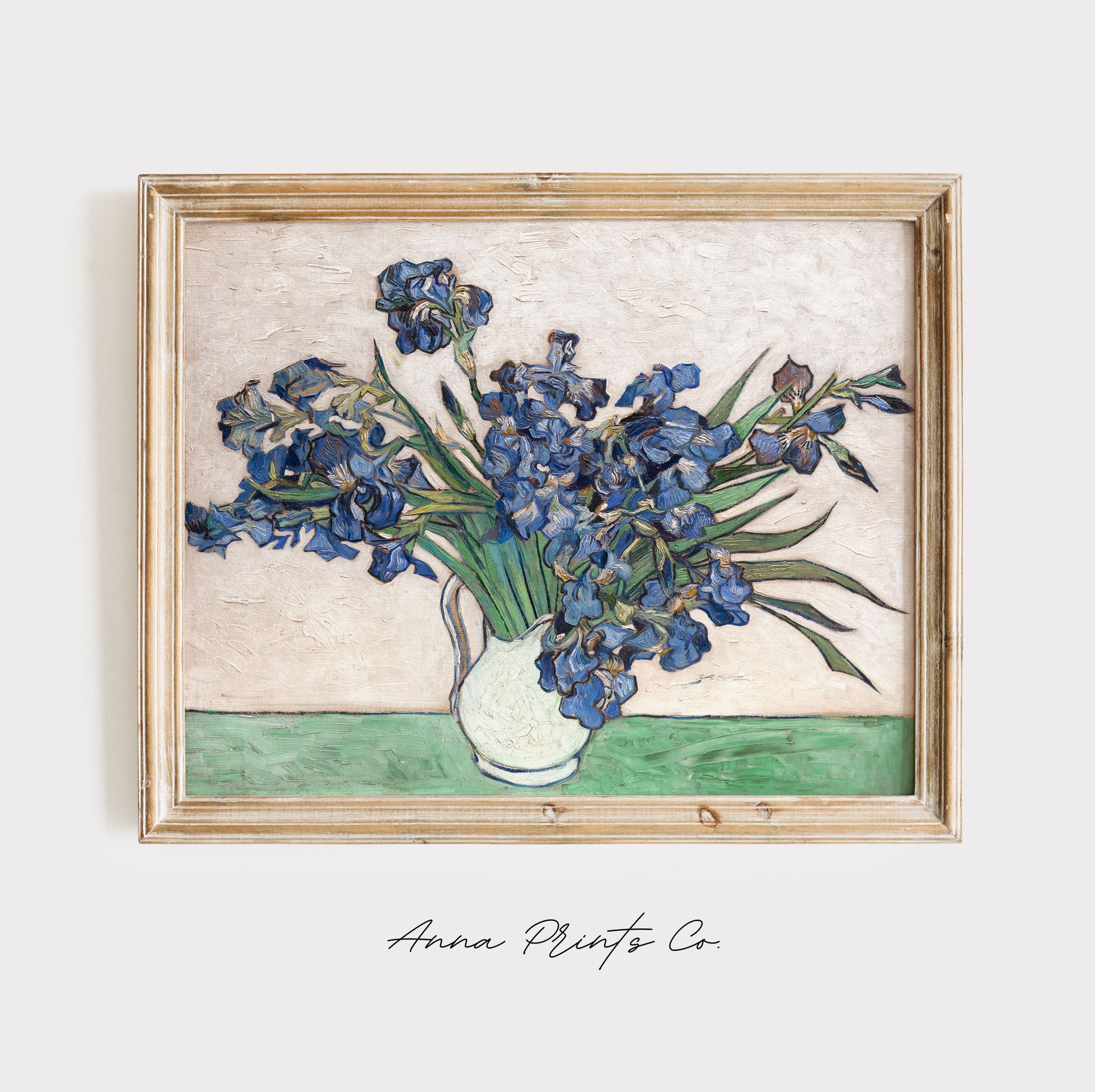 Vintage art print of Irises in Vase by Van Gogh displayed in wooden frame
