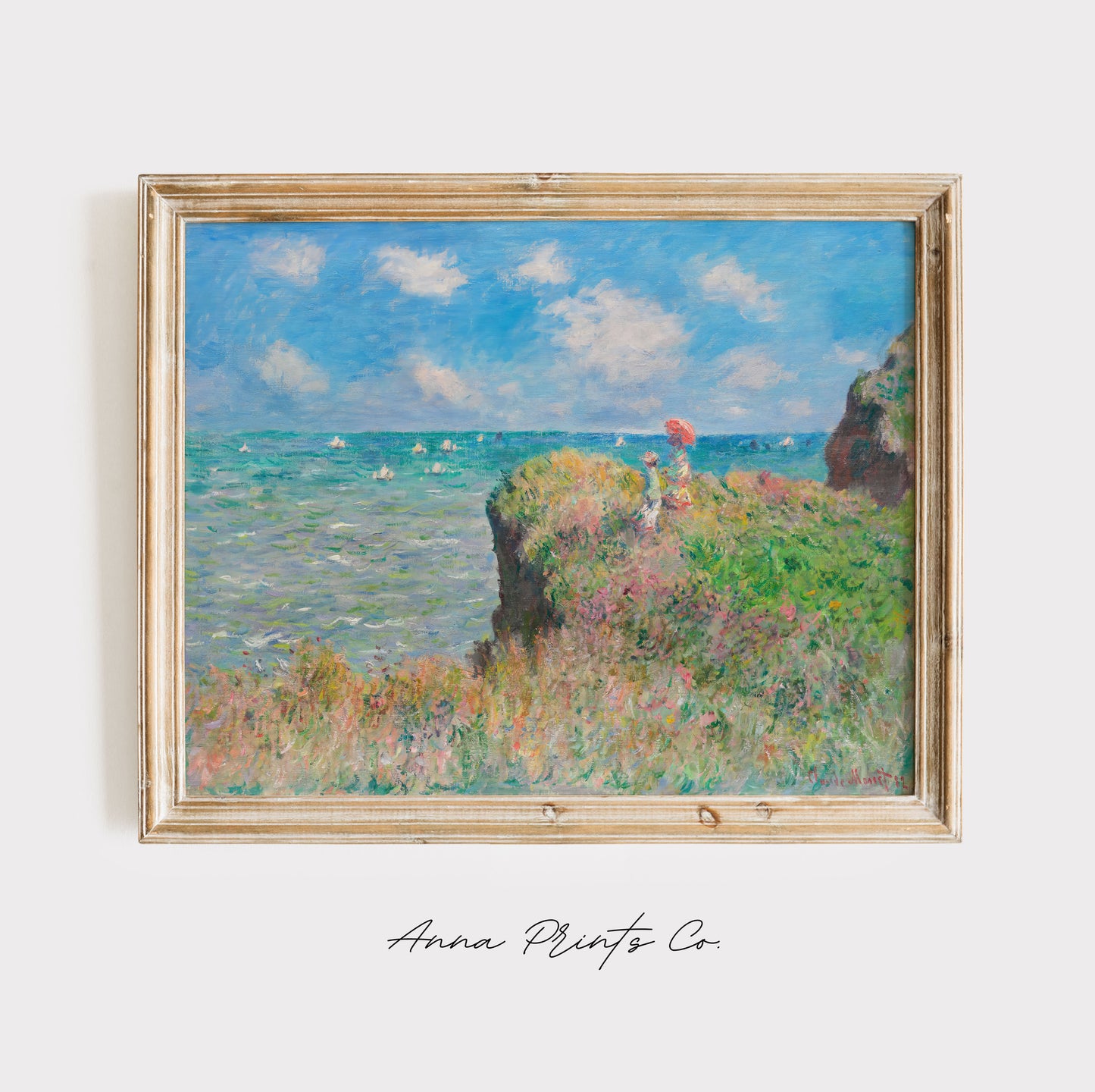Vintage art print of Cliff Walk at Pourville by Monet displayed in wooden frame