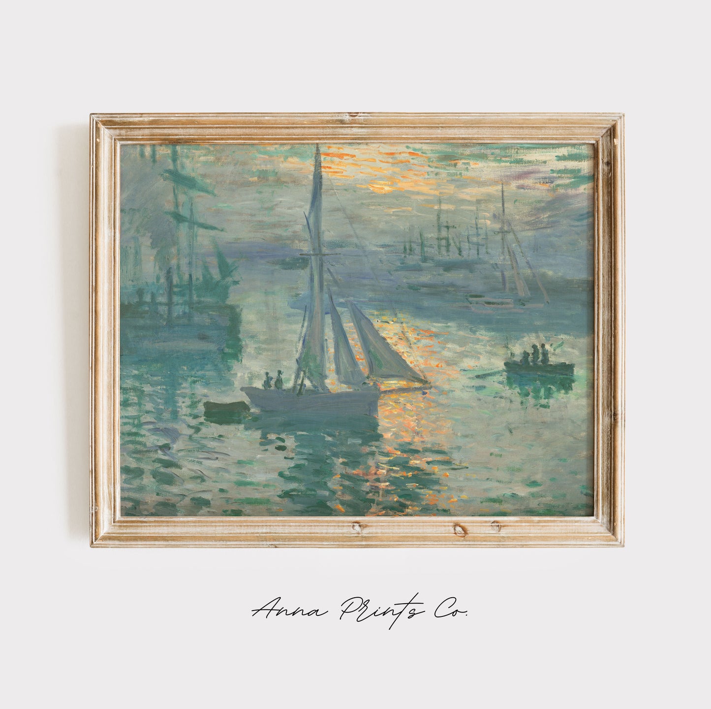 Vintage art print of Sunrise by Monet displayed in wooden frame