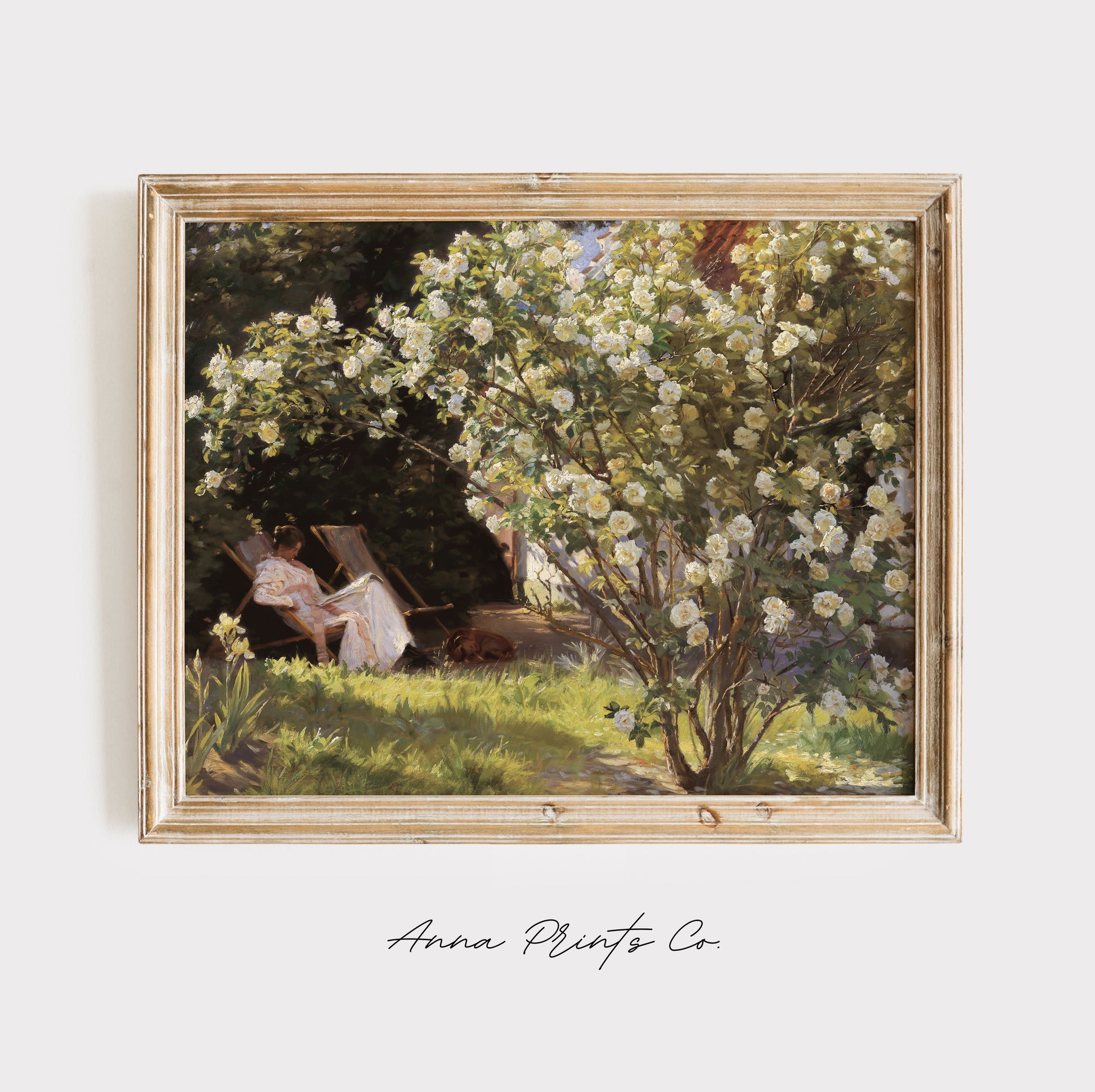 Vintage art print of Woman in Cottage Garden Painting displayed in wooden frame