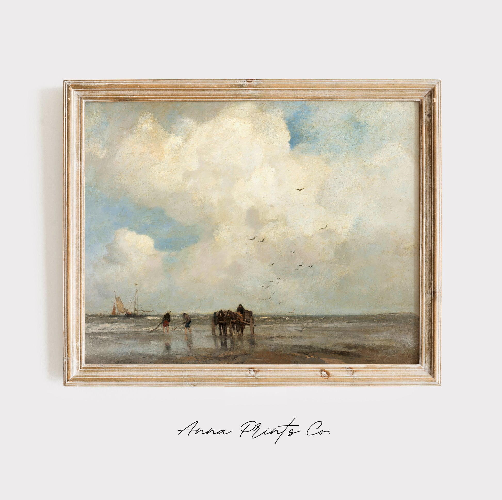 Vintage art print of Clouds over Beach Landscape displayed in wooden frame