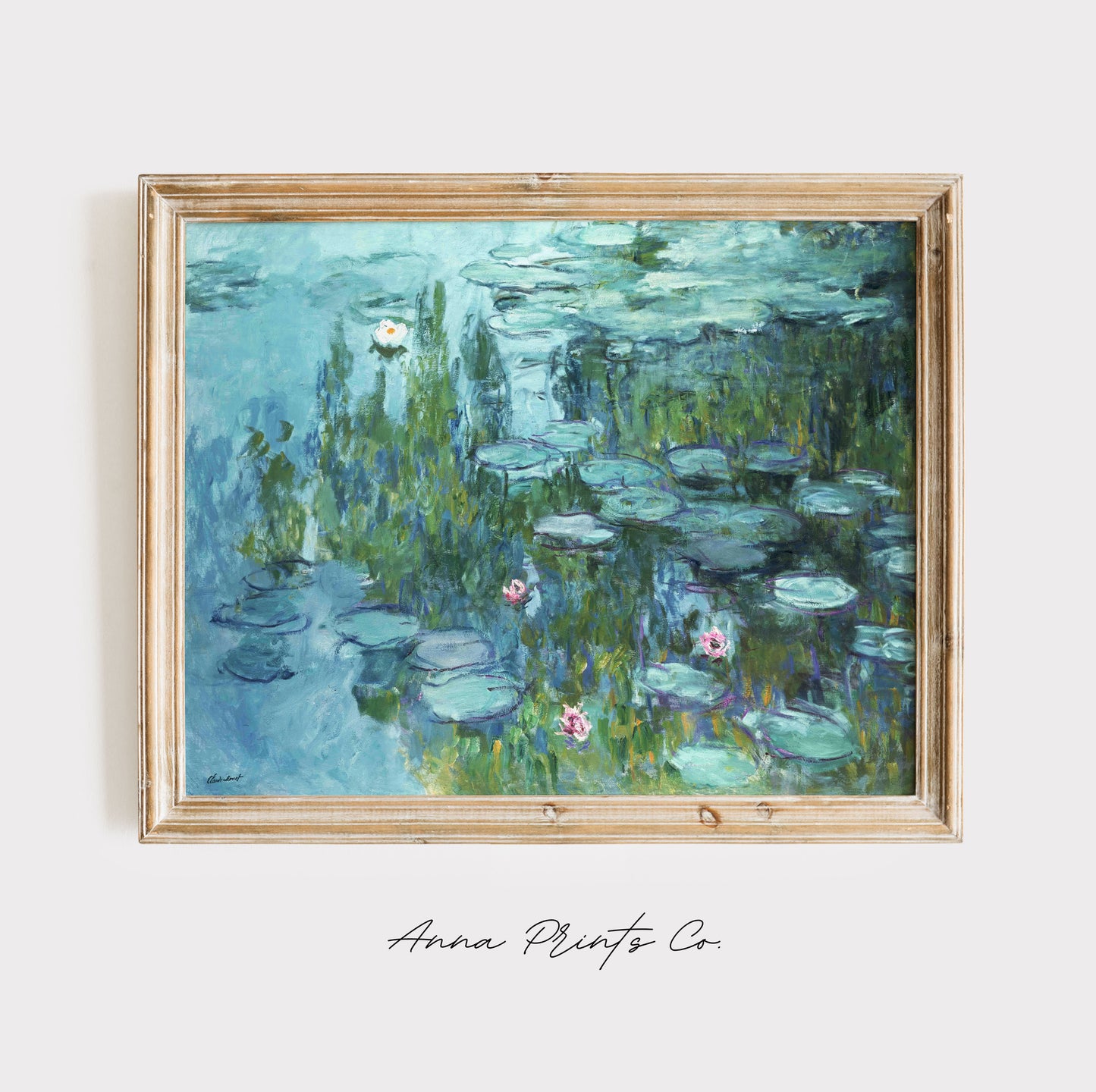Vintage art print of Water Lilies by Monet, c. 1915) displayed in wooden frame