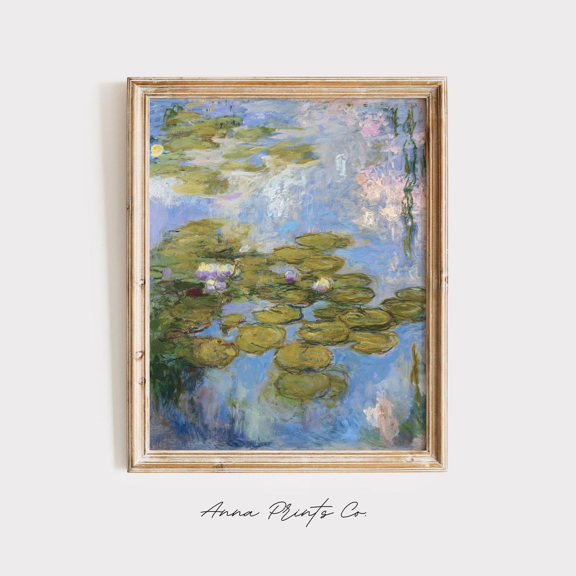 Vintage art print of Water Lilies by Monet, 1919) displayed in wooden frame