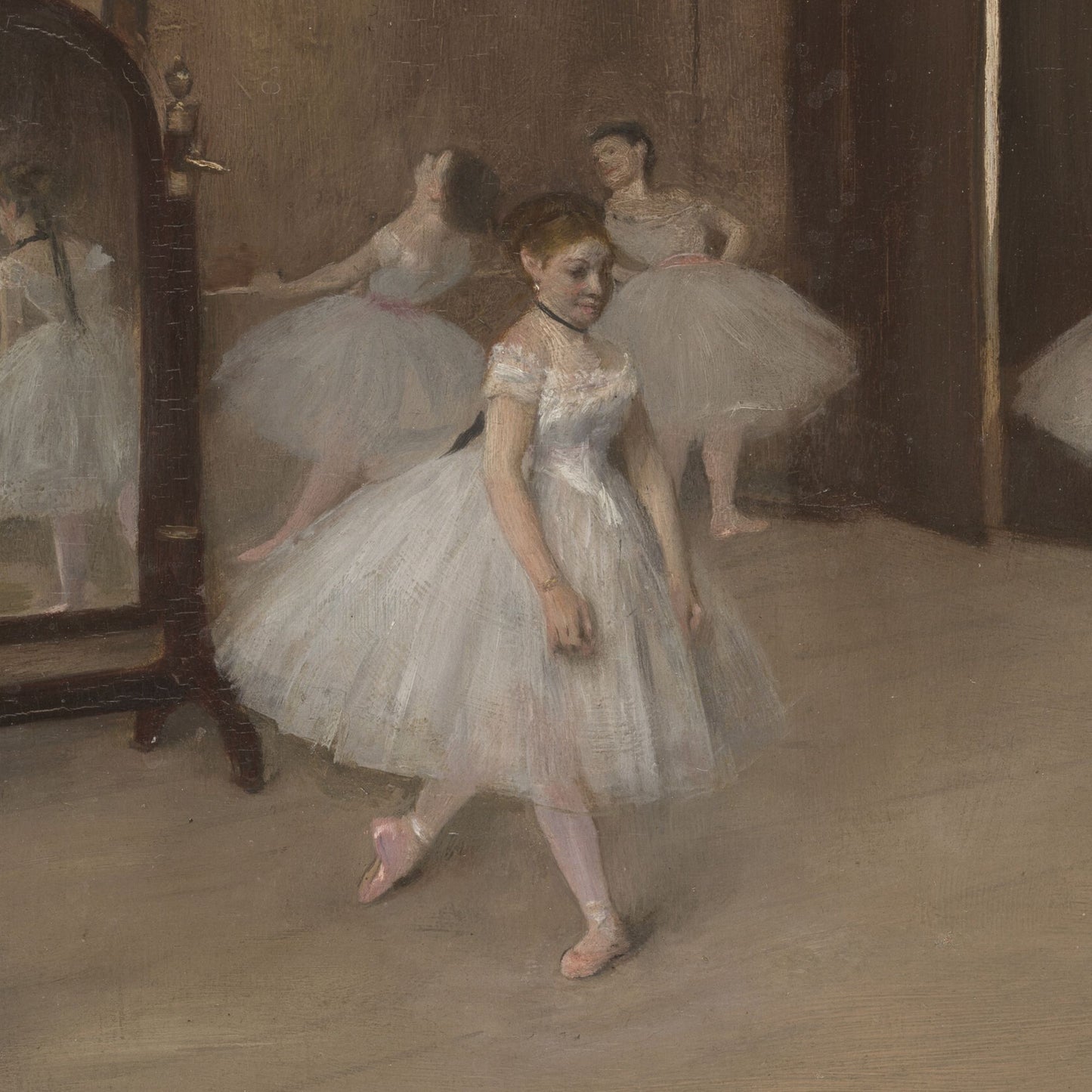 Degas' painting of a ballerina in a tutu practicing in front of a mirror.