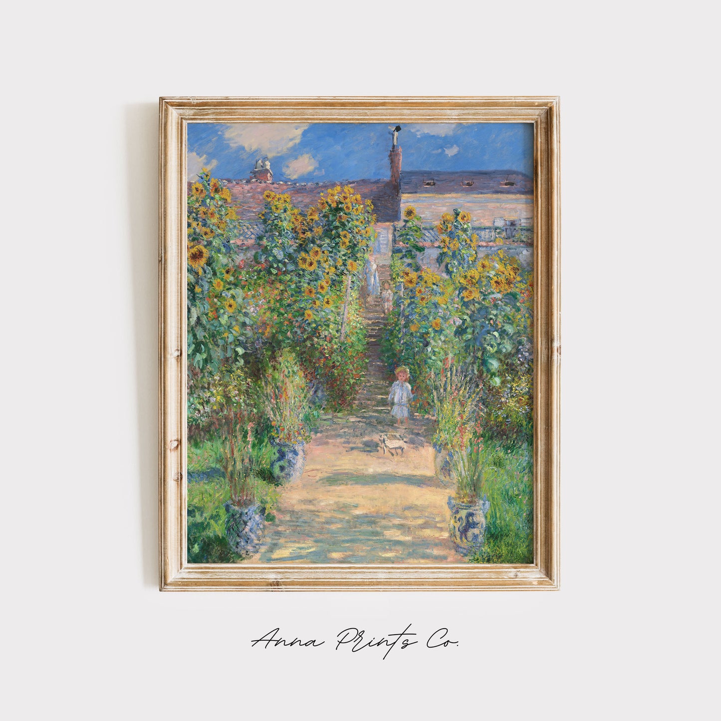 Vintage art print of The Artist's Garden Vétheuil by Monet displayed in wooden frame