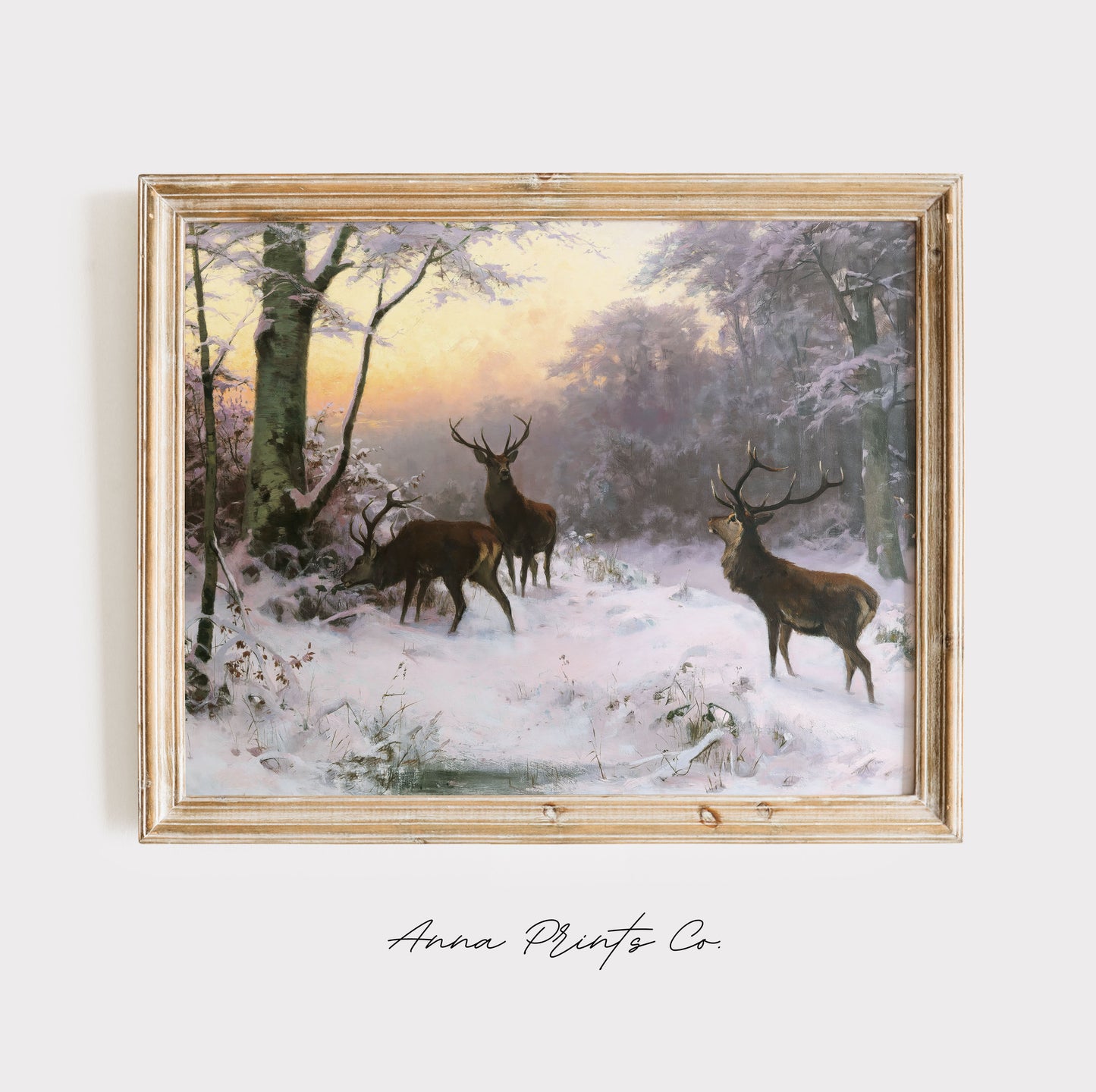 Vintage art print of Deer in Winter Forest Landscape displayed in wooden frame