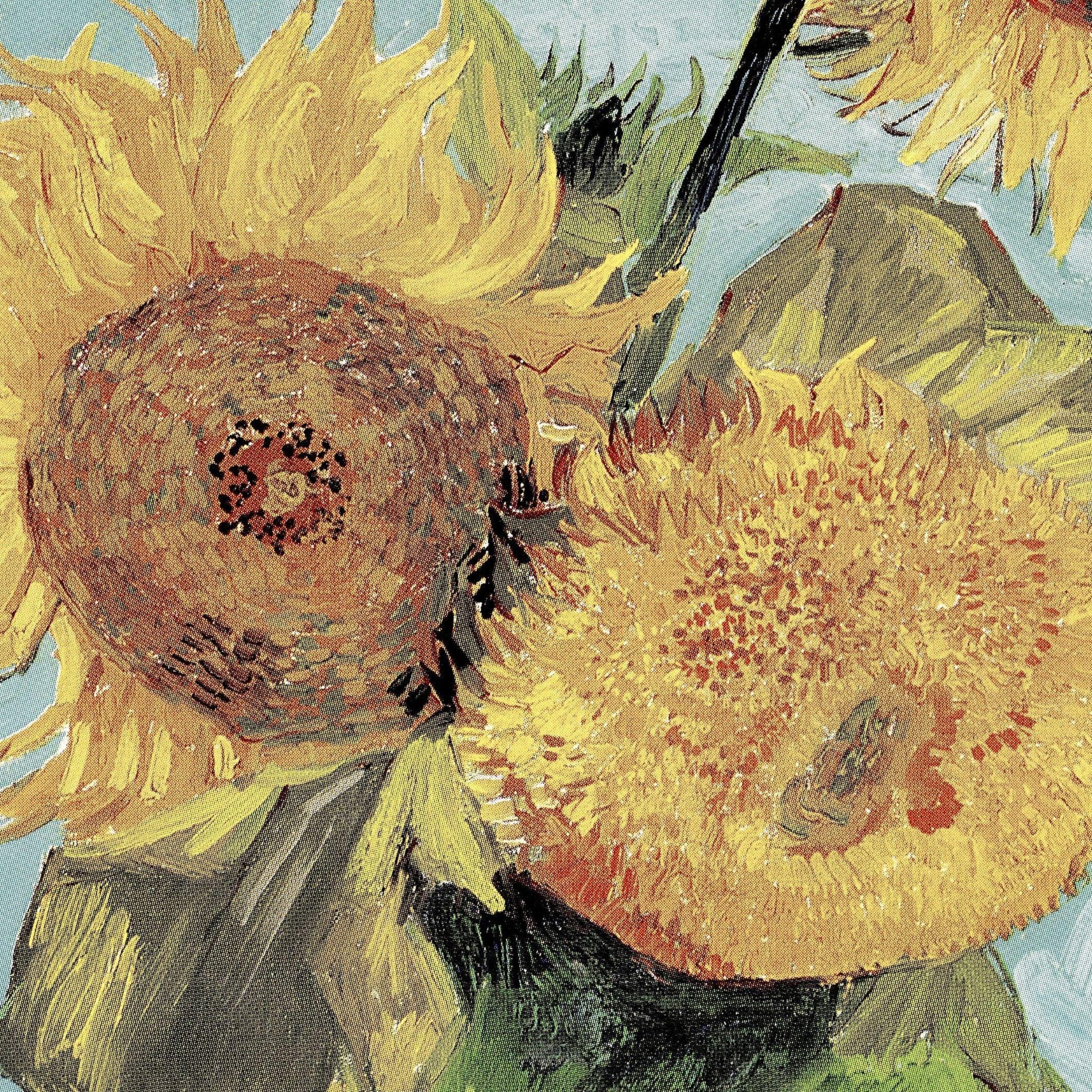 Close-up of Van Gogh's 'Sunflowers' with vibrant yellow and brown colors.