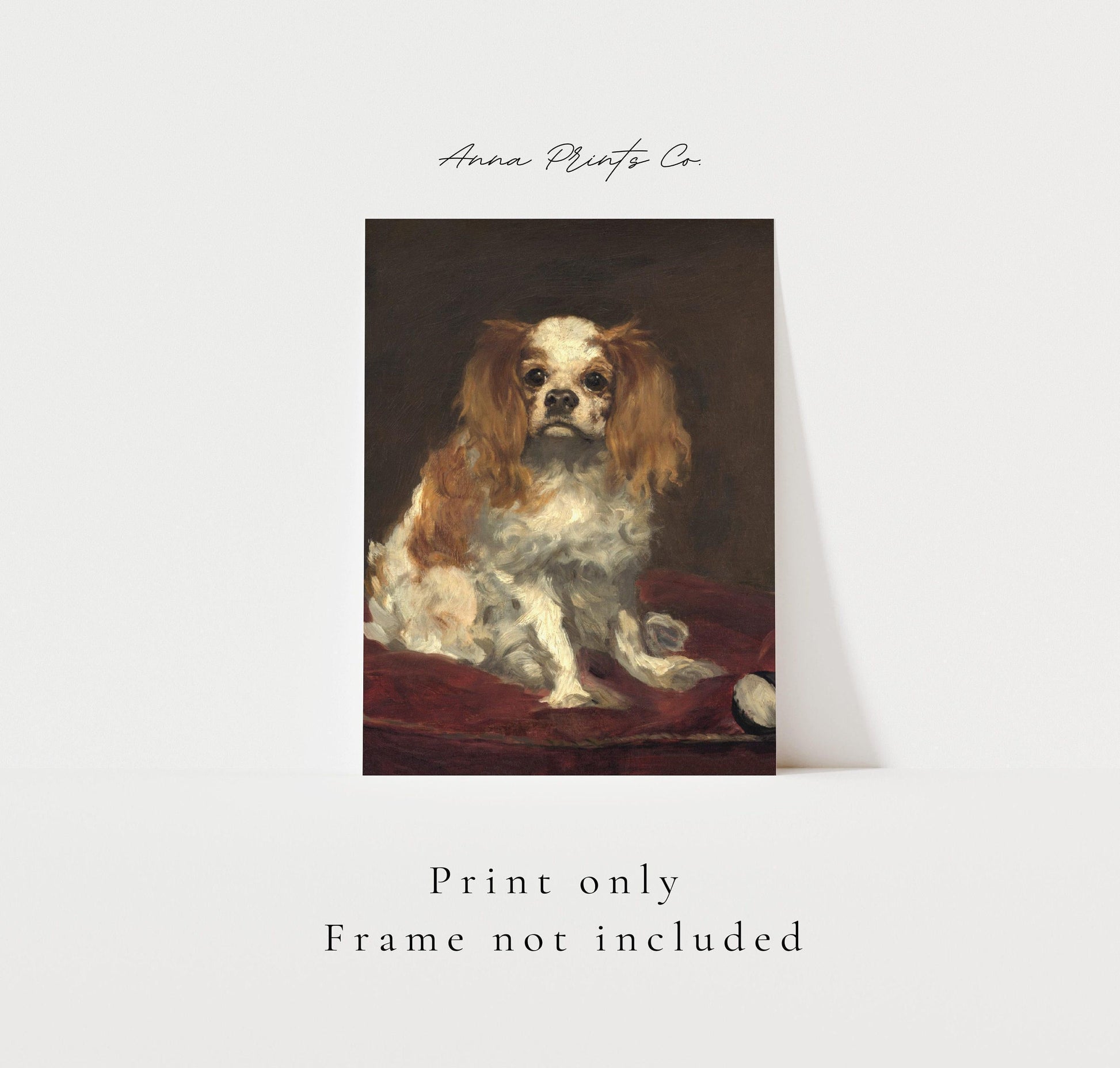 Vintage art print of King Charles Spaniel by Manet with text overlay stating frame not included