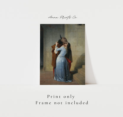 Vintage art print of The Kiss with text overlay stating frame not included